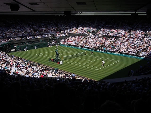 London Weather in July: The Sunniest Month for Activities 3 Wimbledon Tennis Championship game from the stands